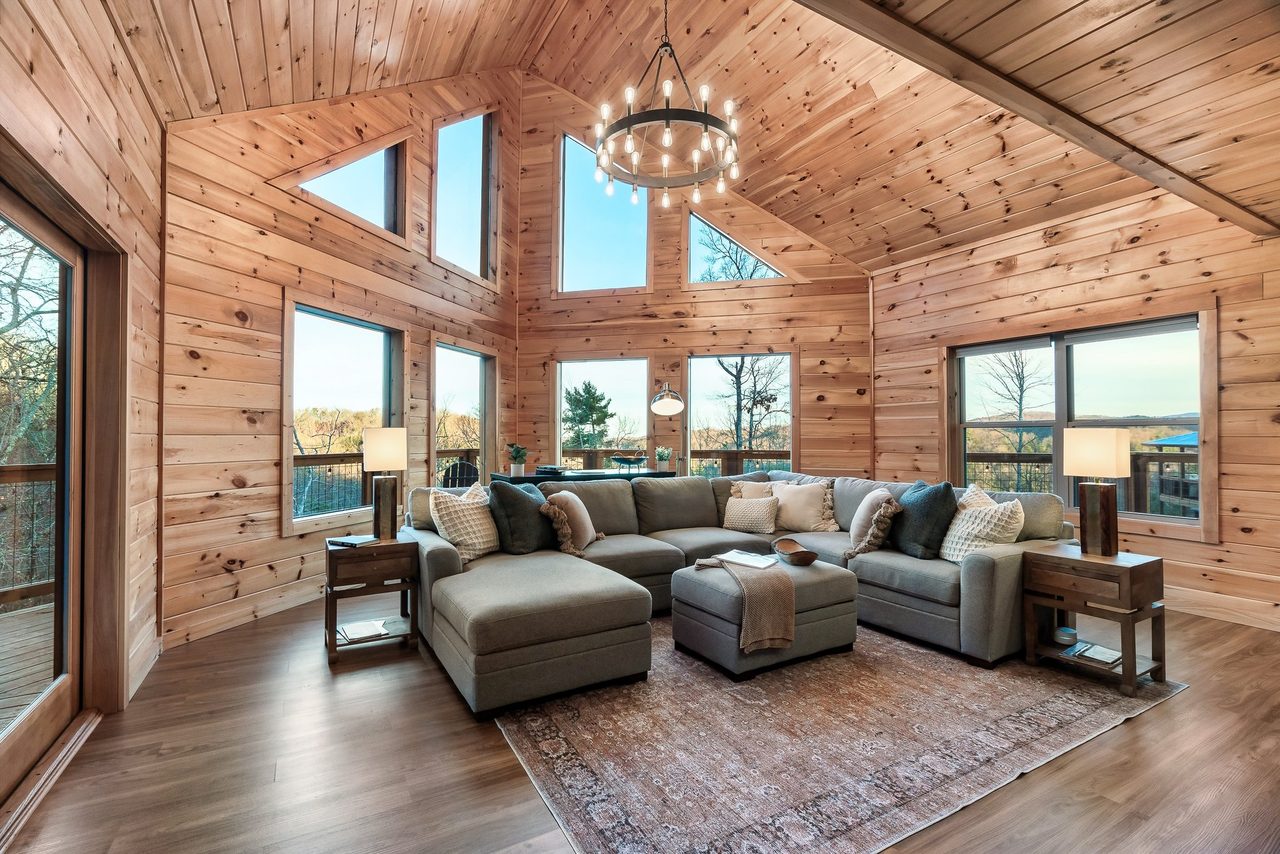 Living room: comfy seating, TV, gas fireplace, & sleeper sofa!