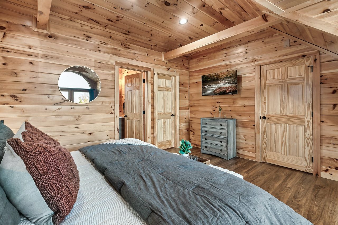 Bed 2: upper level, king, balcony, TV, & ensuite full bath