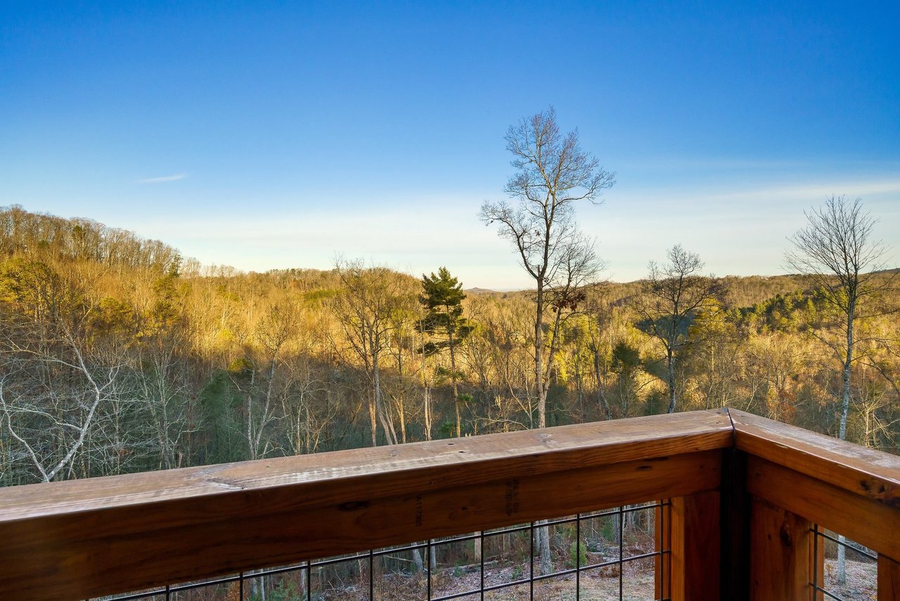 Upper level bedroom balcony with mountain views