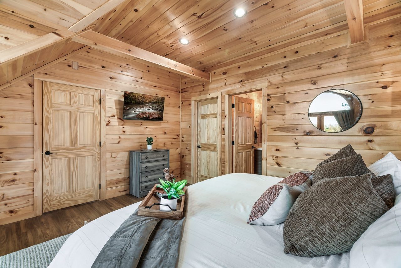 Bed 3: upper level, king, balcony, TV, & ensuite full bath