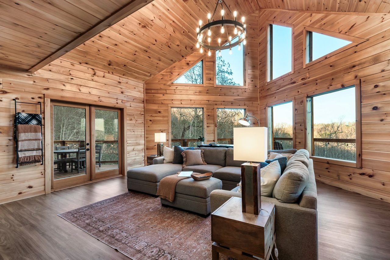 Living room: comfy seating, TV, gas fireplace, & sleeper sofa!