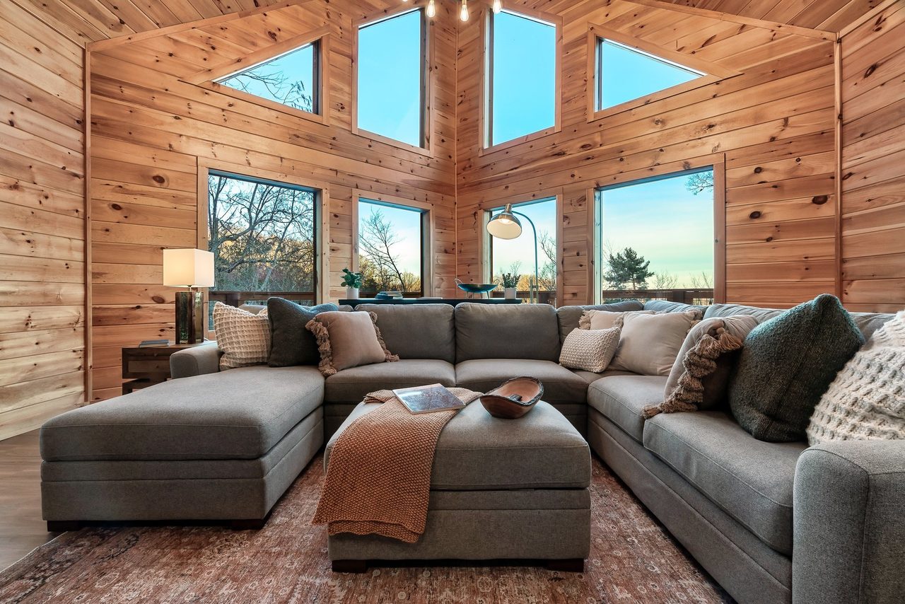 Living room: comfy seating, TV, gas fireplace, & sleeper sofa!